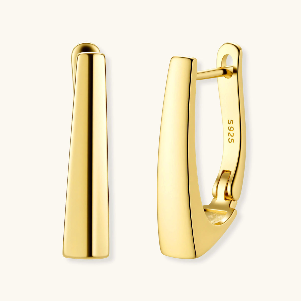 Sleek 14K gold-plated sterling silver huggie earrings with polished finish and geometric elongated design on white background.